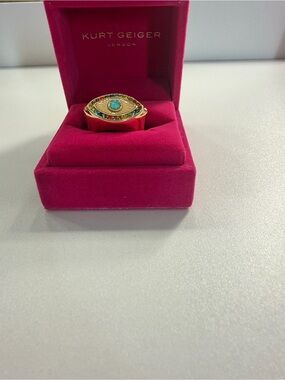 Kurt Geiger gold-tone eye ring with turquoise center and multicolor stones